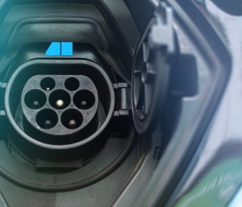 Charging socket of an electric car with blue light